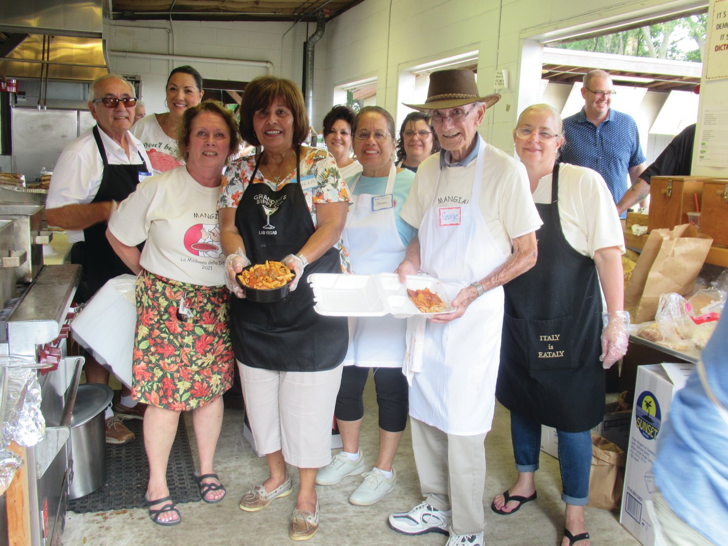 CLASSIC COOKS: These are some of the many dedicated and proud parishioners who performed different kitchen duties during last week’s feast and festival in Johnston.